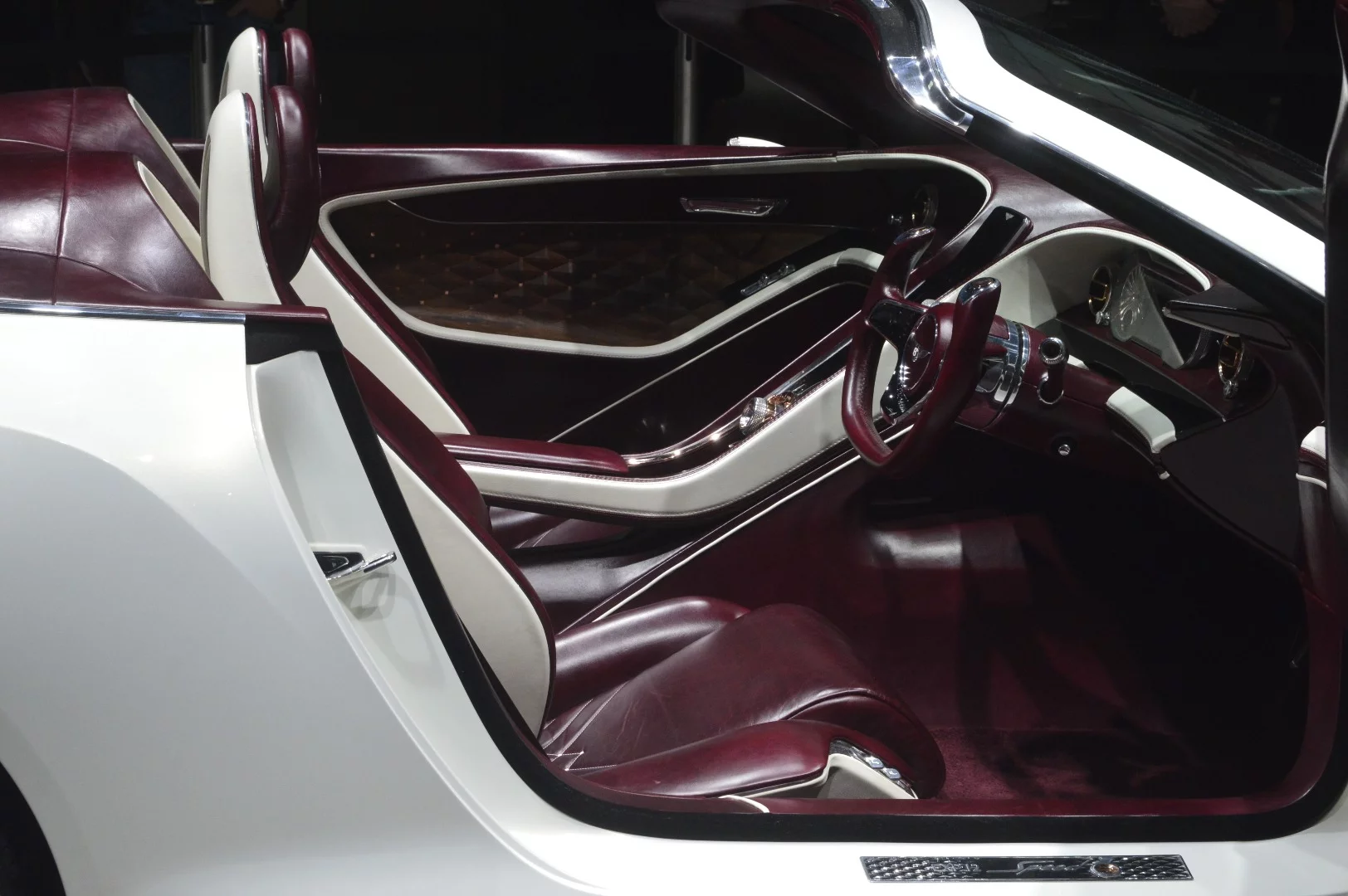 The cabin of the EXP 12 Speed 6e is beautiful in plum leather