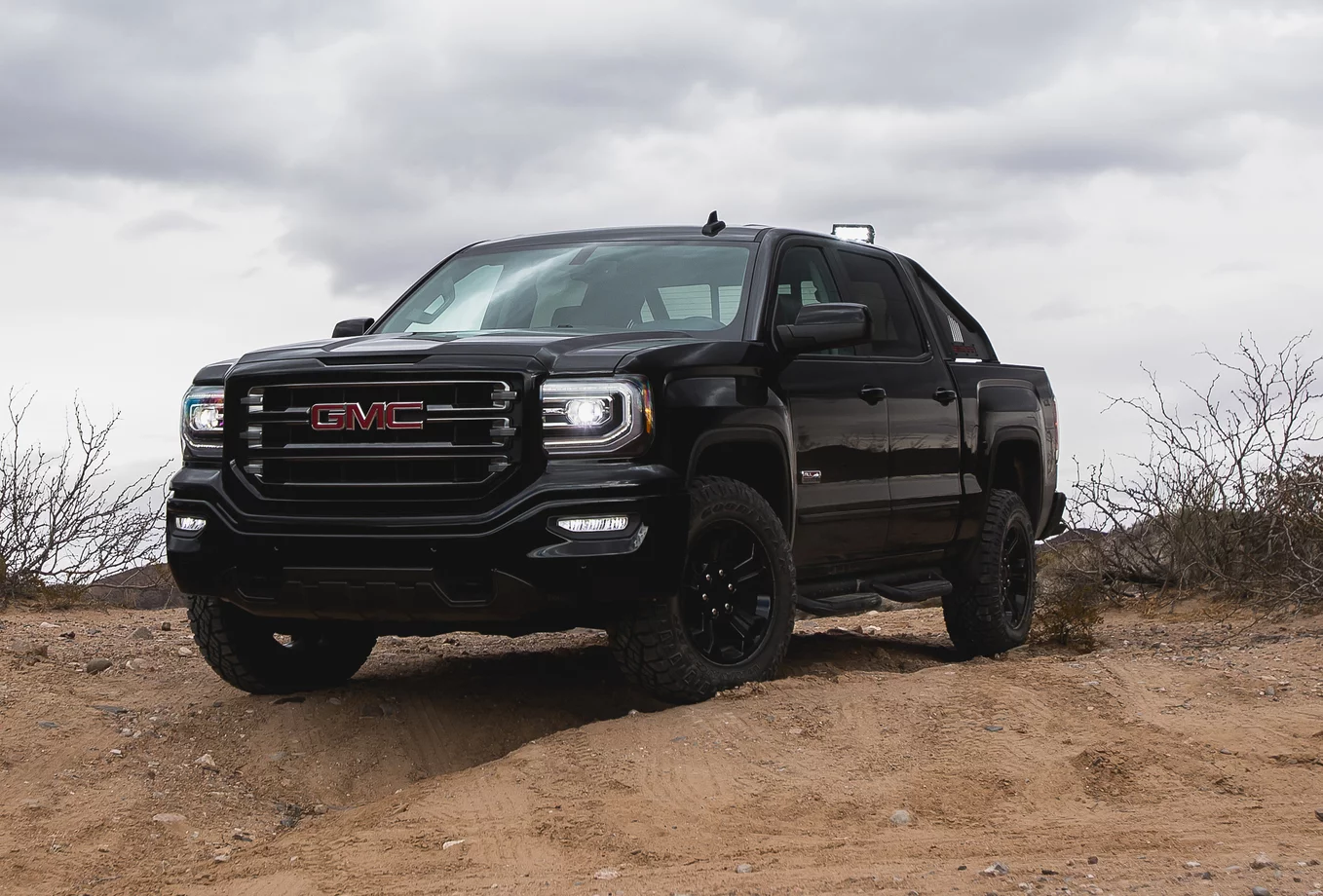 The GMC Sierra 1500 All Terrain is the factory-made offroad version of the half-ton truck and the X model adds some common equipment enthusiasts often add themselves