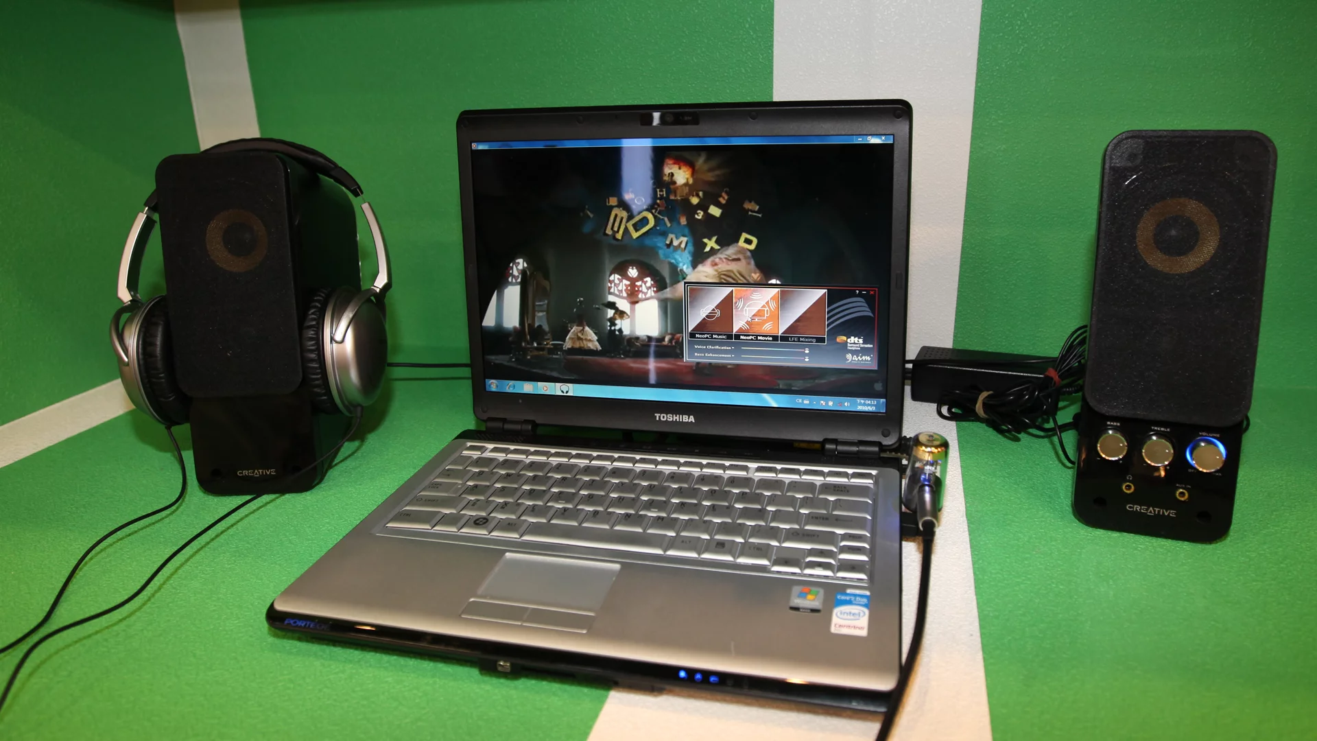 Said to deliver bass-enhanced surround sound through any speaker or headphone connected to it