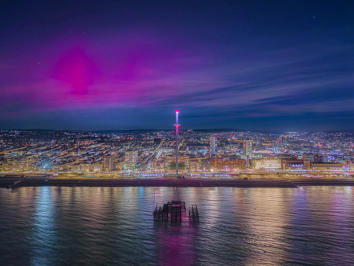Aurorae Highly Commended: Aurora Borealis over Brighton Seafront © Michael Steven Harris (UK). A drone image of the aurora over Brighton, UK.