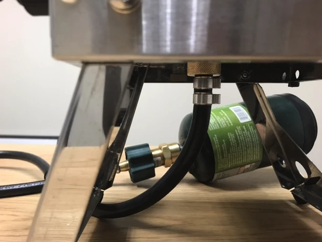 Kariba stove-showers operate on propane or butane