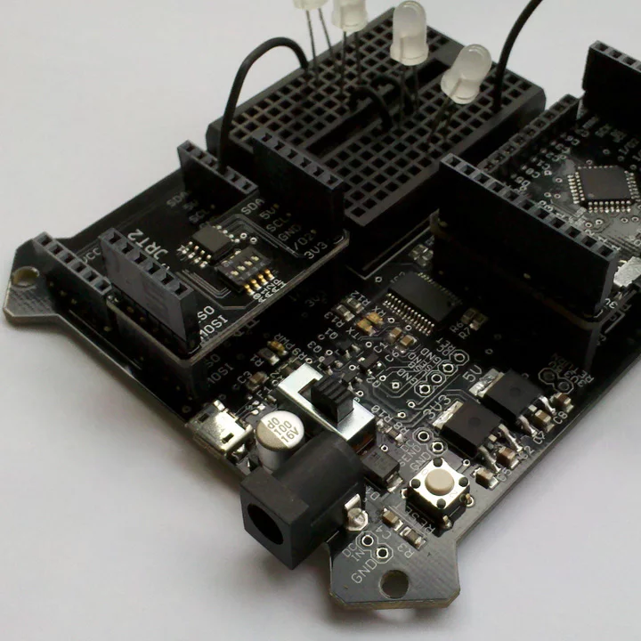 The BoardX motherboard with add-ons installed, and some white LEDs for good measure.