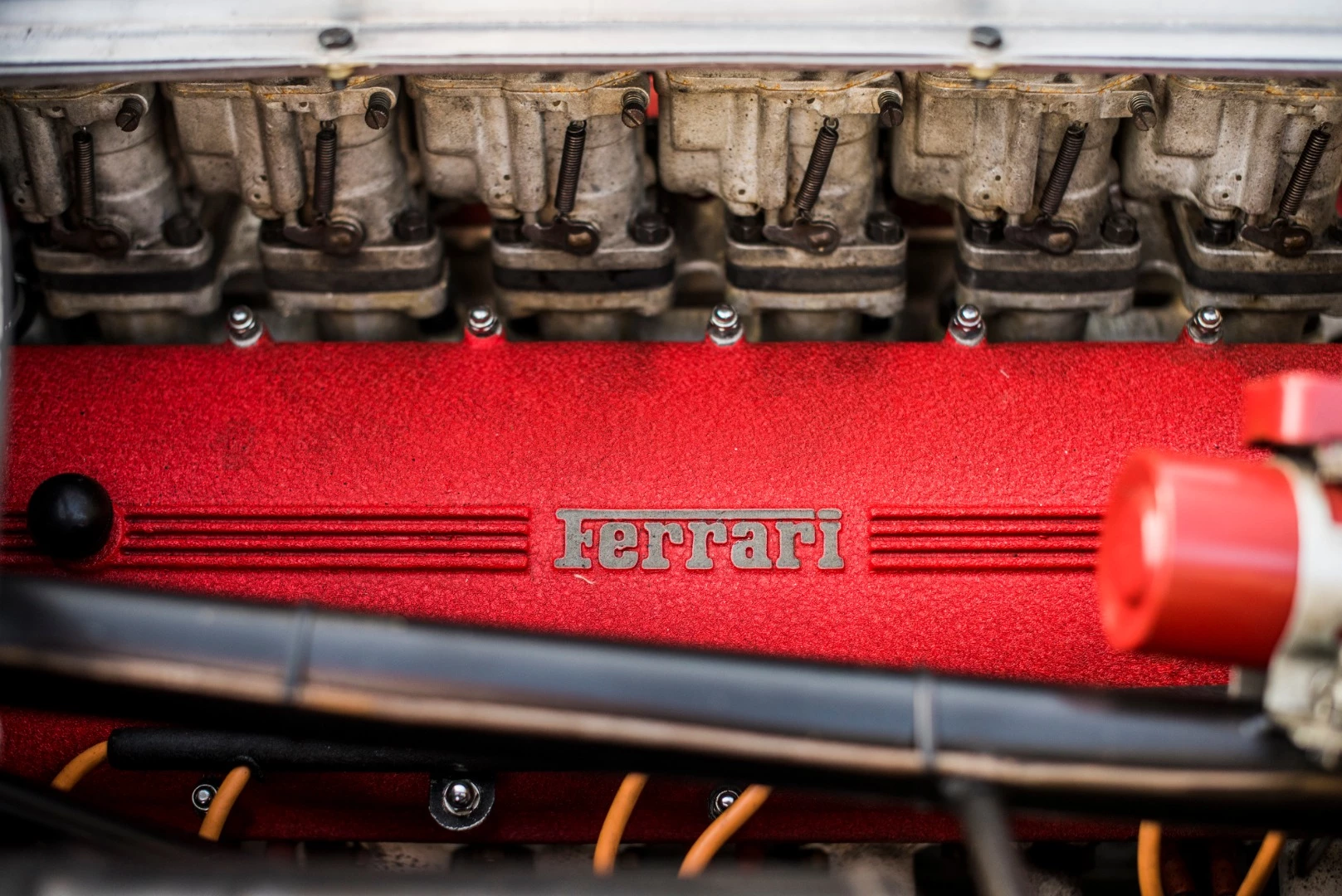 The Ferrari 275P runs a 3.3 liter V12 that produced 316hp at 7700rpm