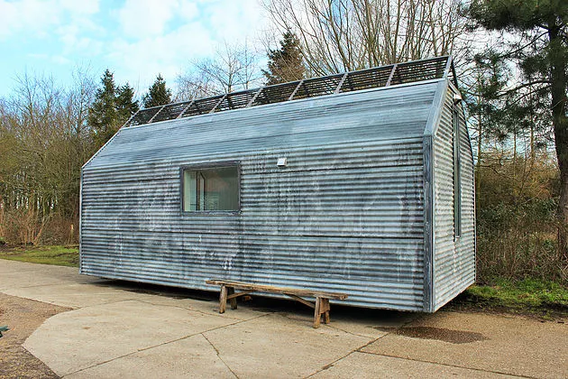 The exterior is clad in corrugated steel