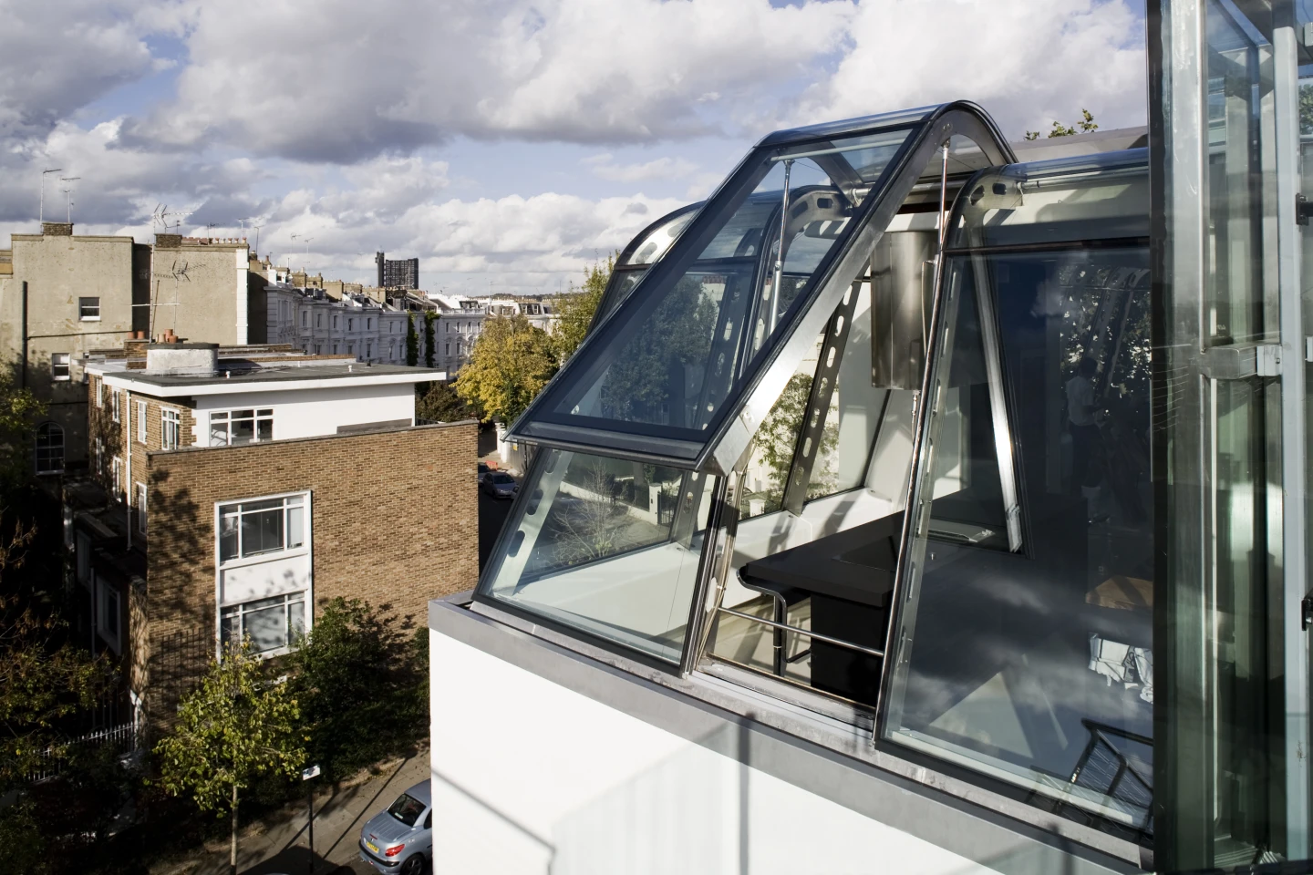 Private access to the property is gained by passing through a Panasonic iris-identification system, and then riding a glass elevator to the top floors