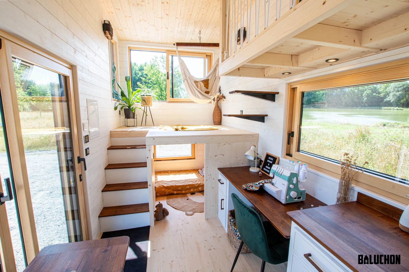 The Nouvelle Dans' interior looks light-filled thanks to its generous glazing