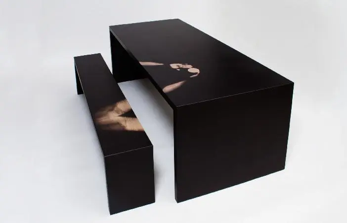 A new thermochromic table and bench set changes color wherever it's exposed to the user's body heat