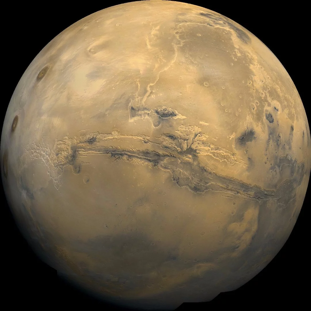Valles Marineris can be seen running along the Martian equator