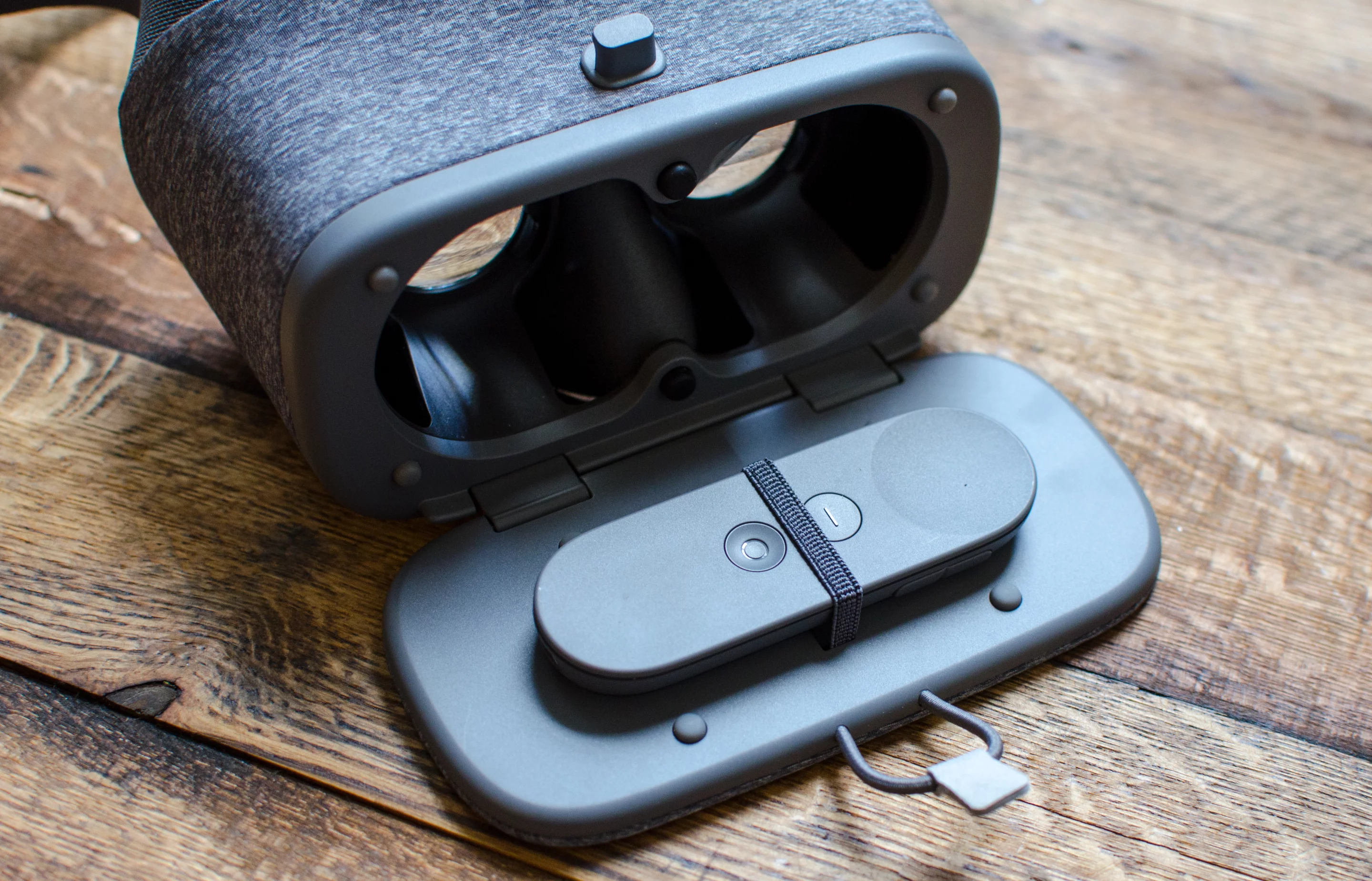 The controller stashed in its storage compartment