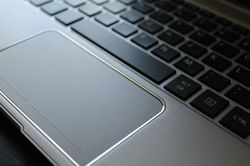 The touchpad is framed with a beveled border