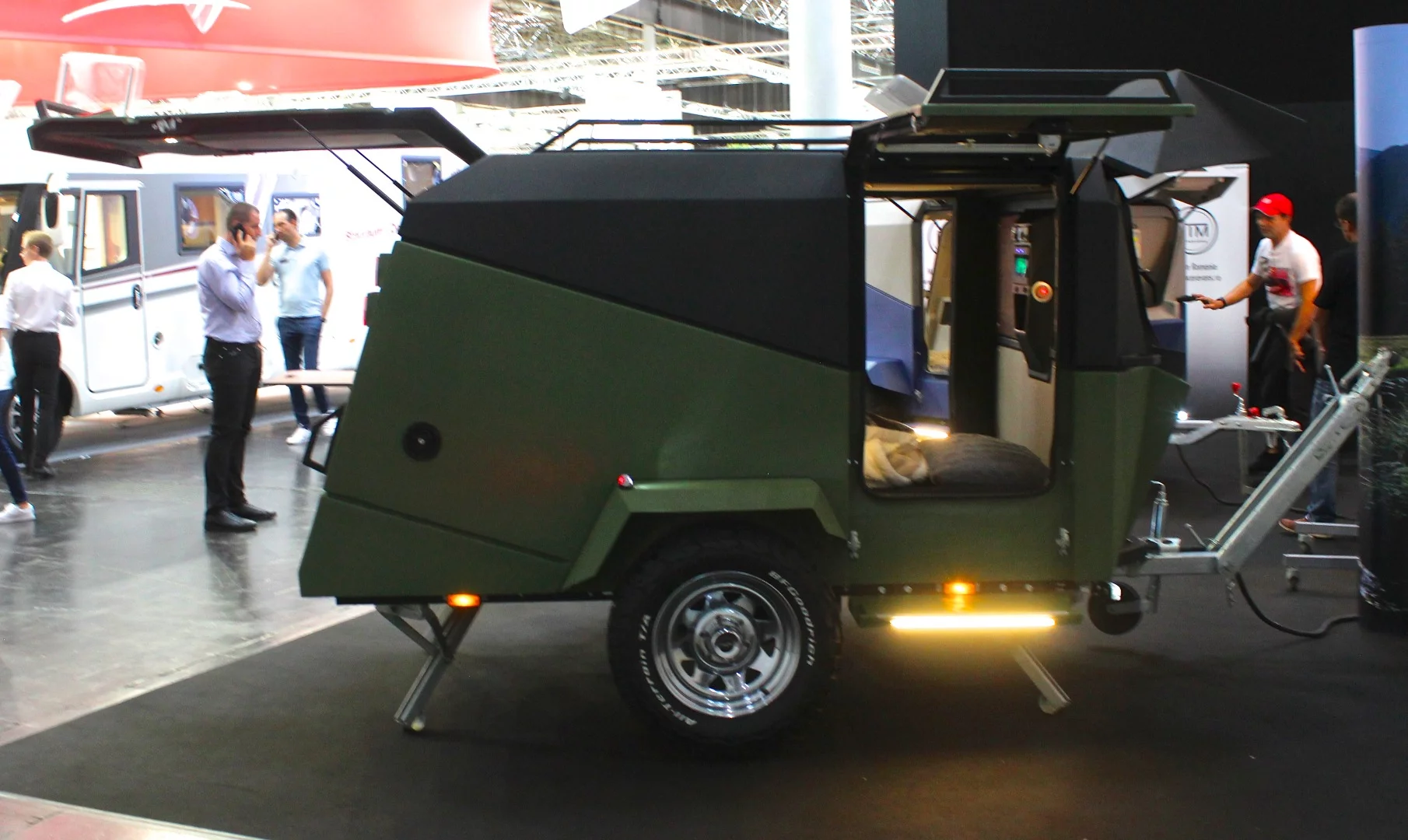 The triple-wing Migrator has dual gullwing side doors and a rear lift-gate