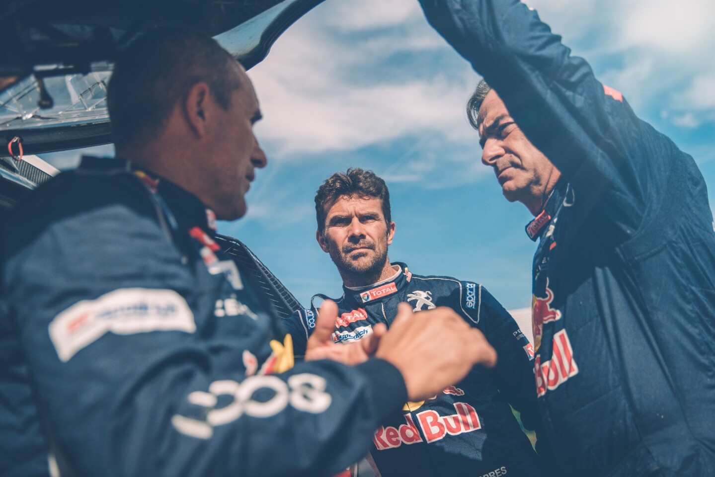 Cyril Despres (facing camera above) won the Dakar Rally five times on a KTM motorcycle before switching to Peugeot cars in 2015 and his finishes since then have been 34th in 2015, then seventh in 2016, then third in 2017