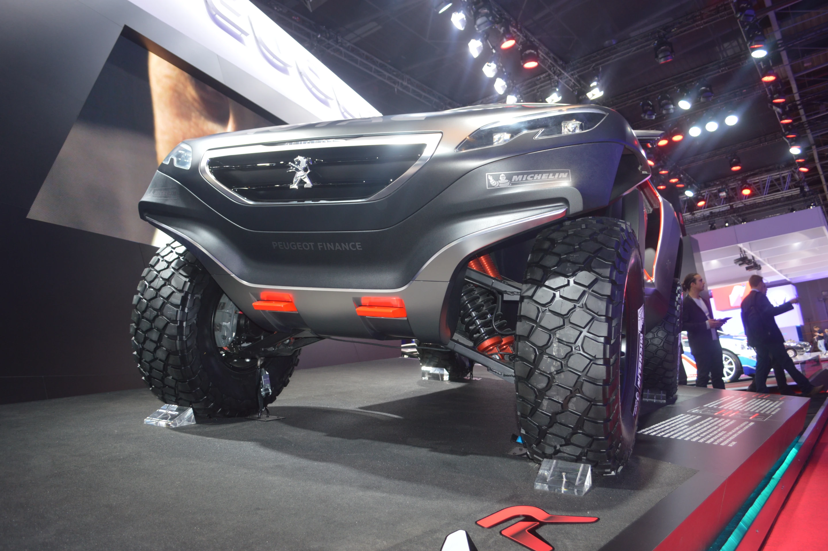 Peugeot gives the Paris Motor Show crowd a look at its rugged rally machine (Photo: C.C. Weiss/Gizmag)