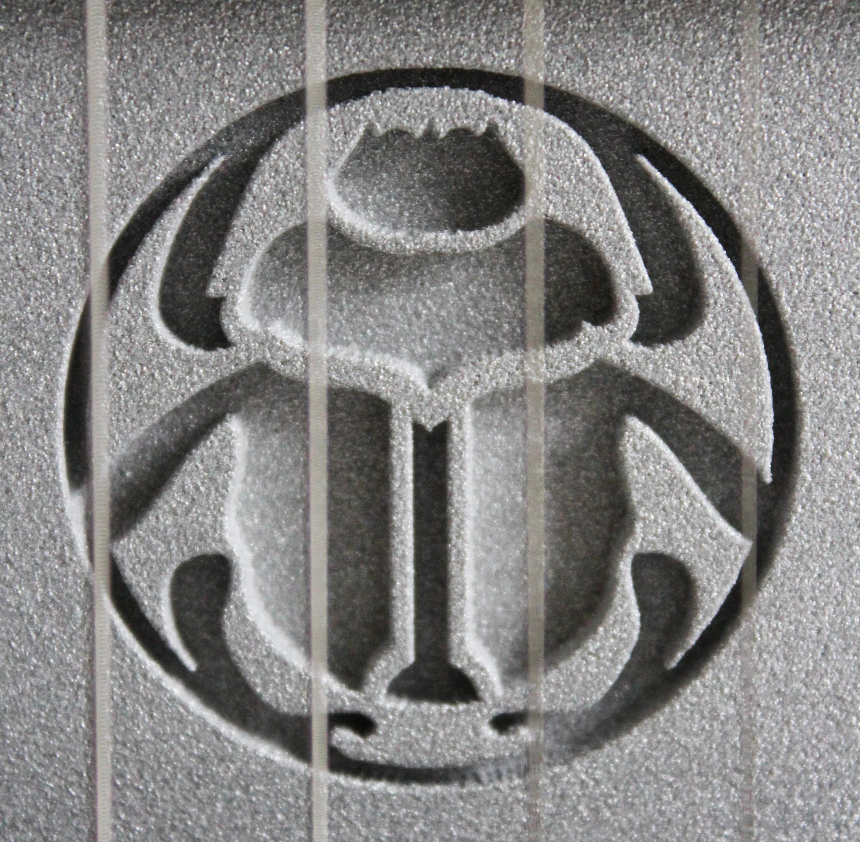 Identifying the model, a Scarab sits between the humbucking pickups