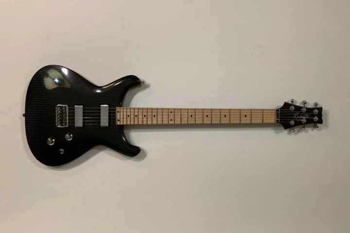 The Rubato Lassie has a single-piece carbon fiber body and neck and relies on the material's strength and rigidity to keep the neck from bending