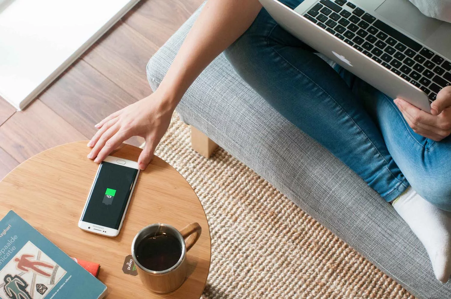 The FurniQi side table provides convenient, cable-free charging with Qi-enabled devices