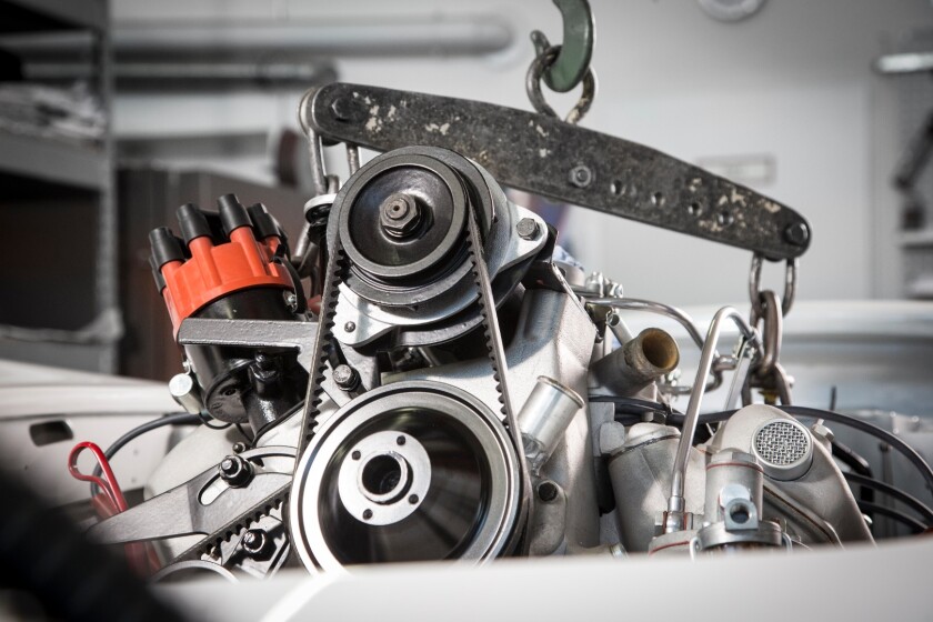 The new engine is lowered into the 507's body