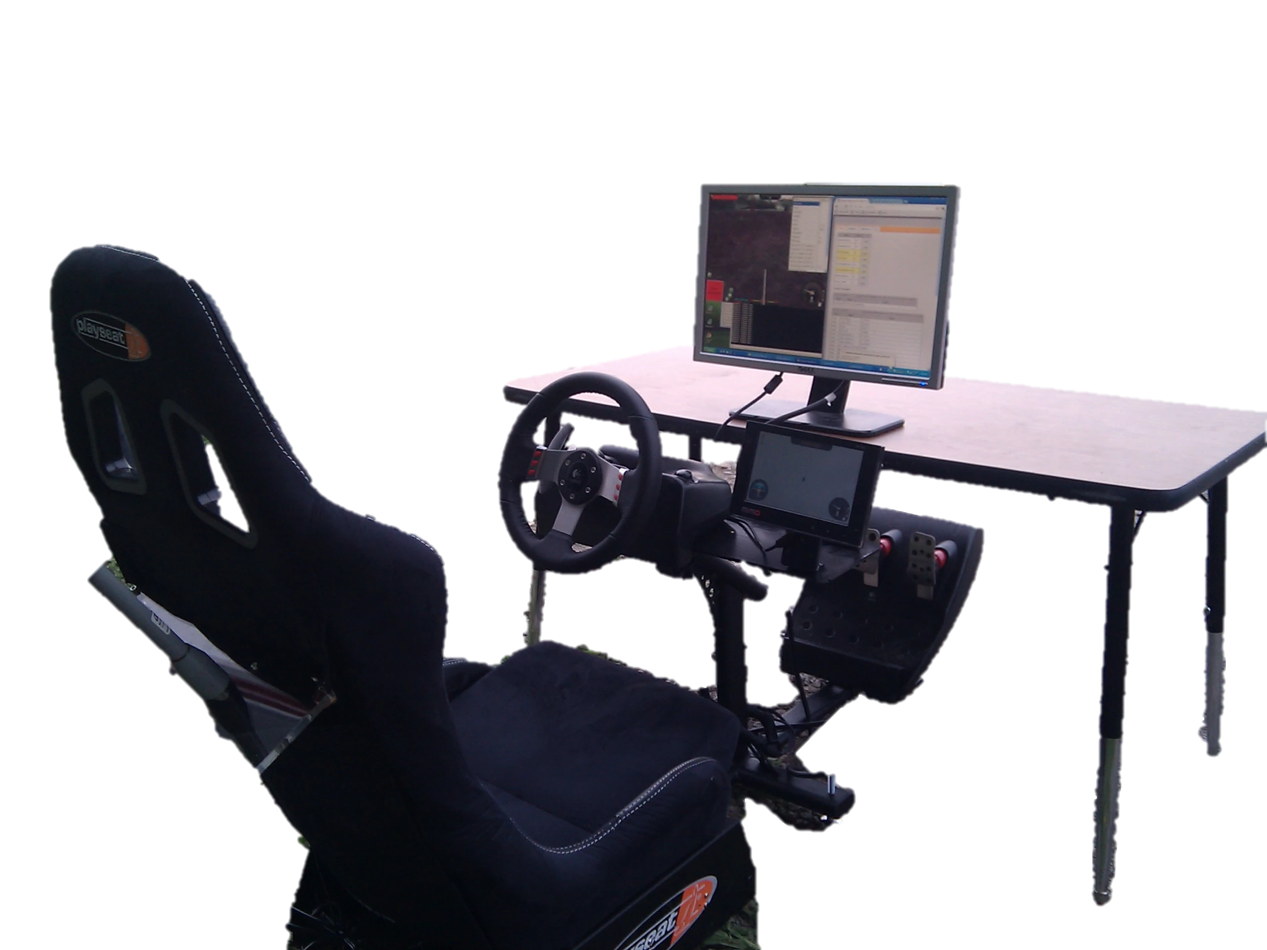 Test drivers were sat in front of a computer monitor showing a forward-pointing video feed streamed wirelessly from a heavily modified Kawasaki 4010 Mule out on an obstacle-laden test range (Photo courtesy of Sterling Anderson)