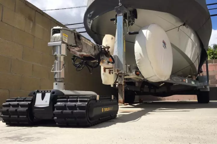The Trailer Valet RVR's heavy-duty caterpillar treads reportedly allow it to operate on a variety of surfaces