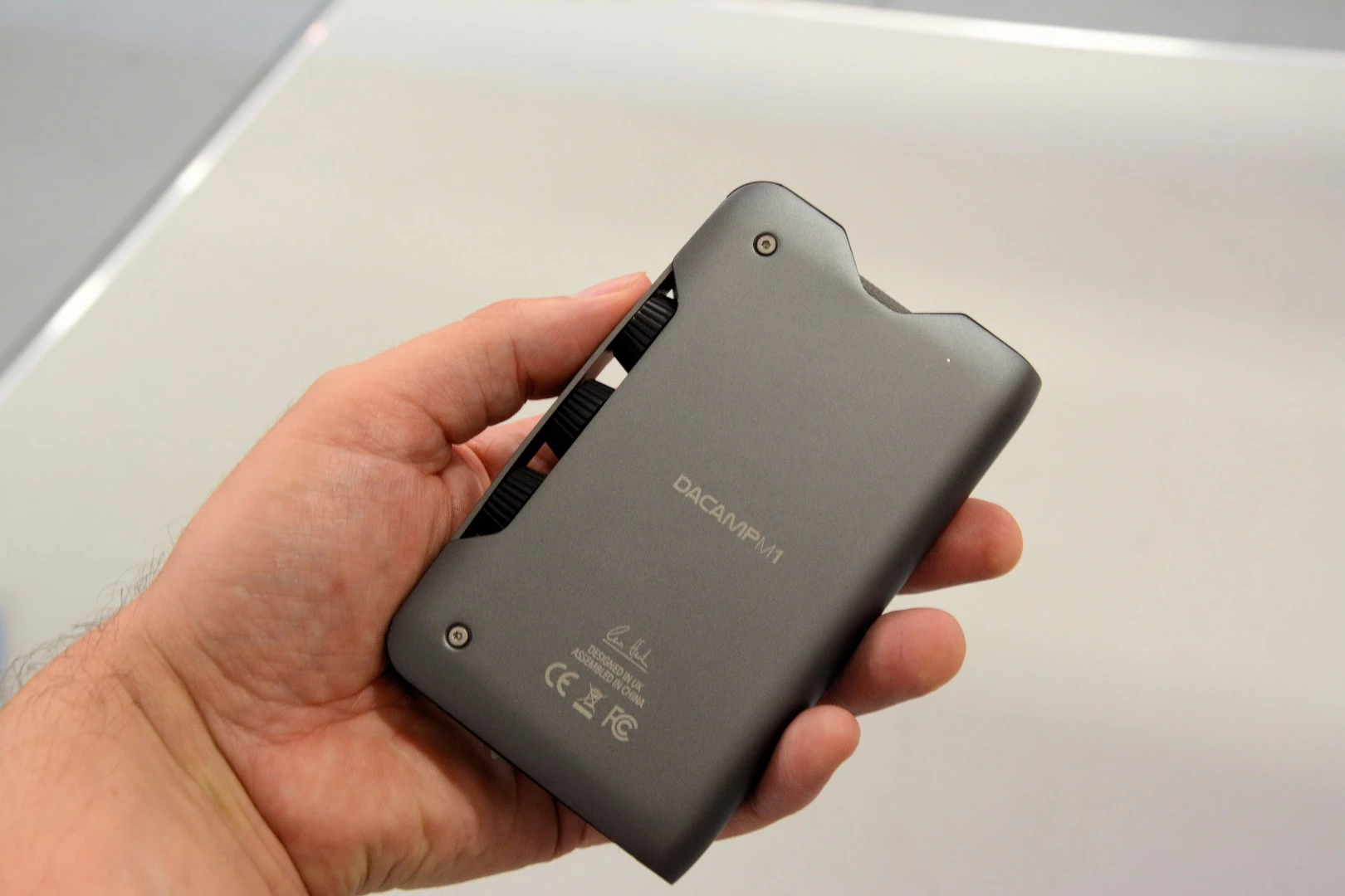 The DACAMP's internals are enclosed in an attractive book cover-like steel jacket