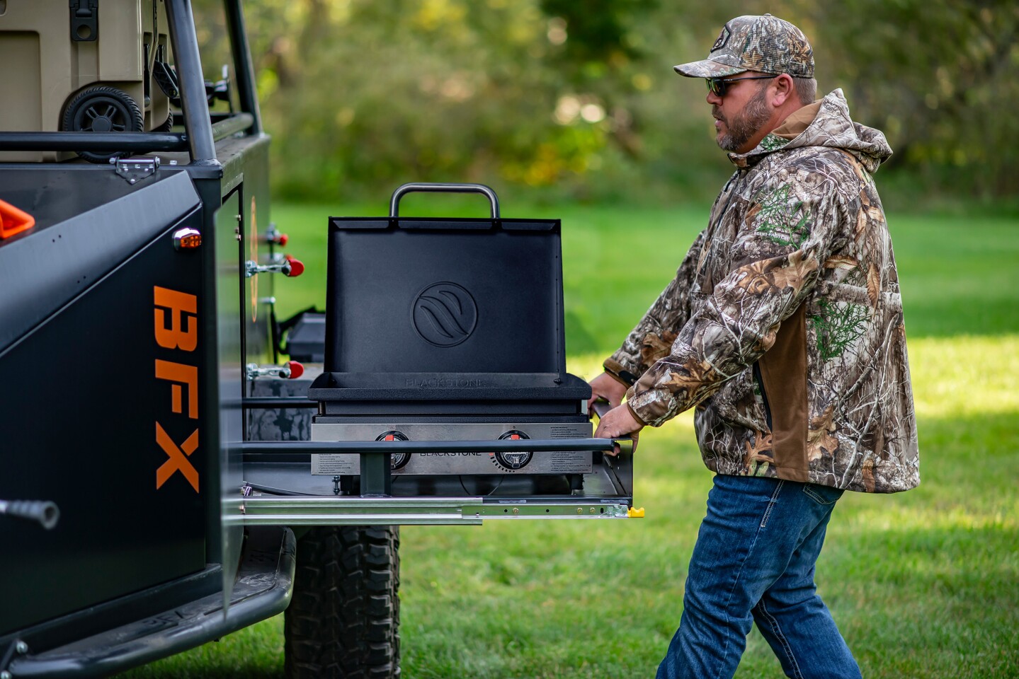 In place of the typical dual-burner stove, the BFX trailer includes a slide-out Blackstone griddle for cooking