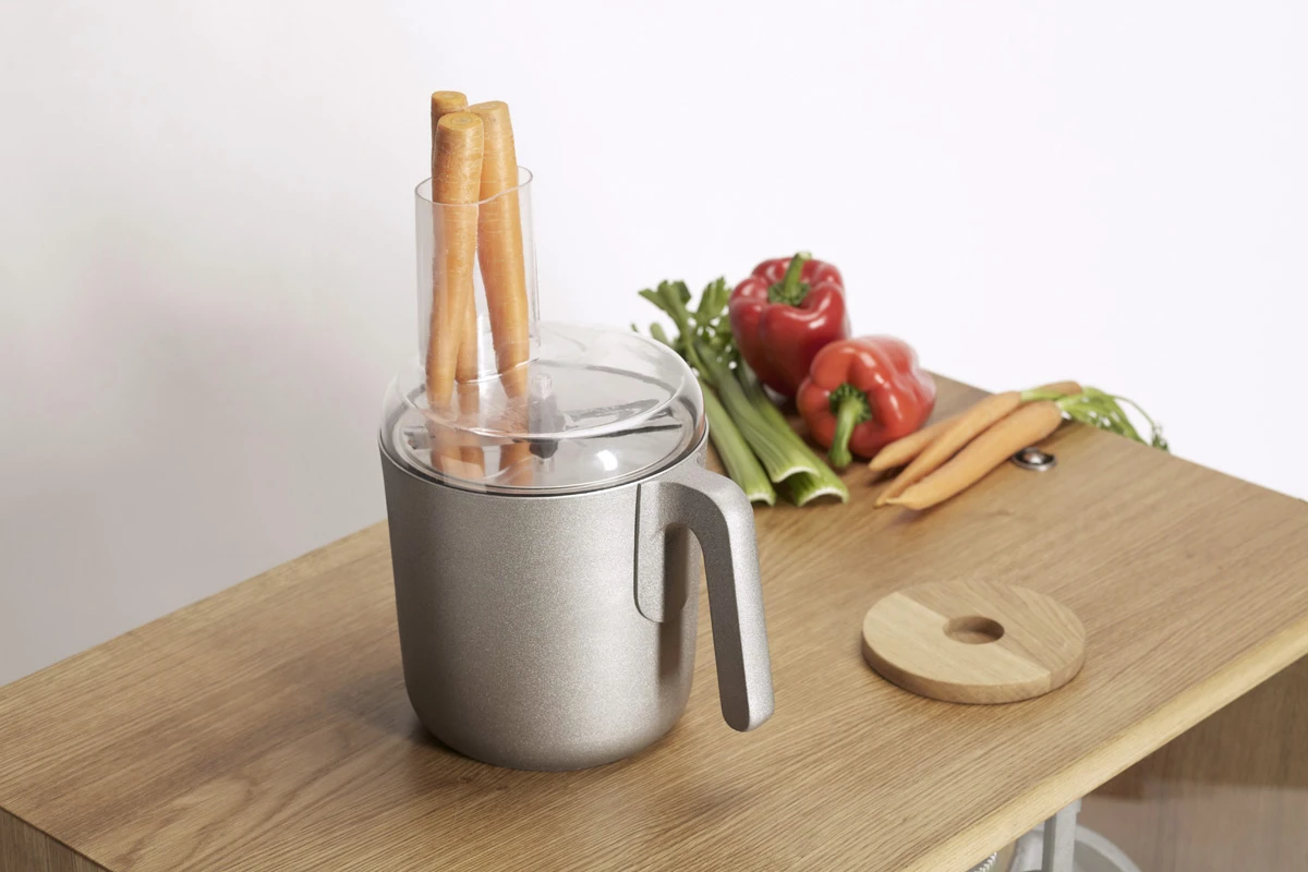 The multi-functional kitchen machine, with various blades, chopping discs and attachments