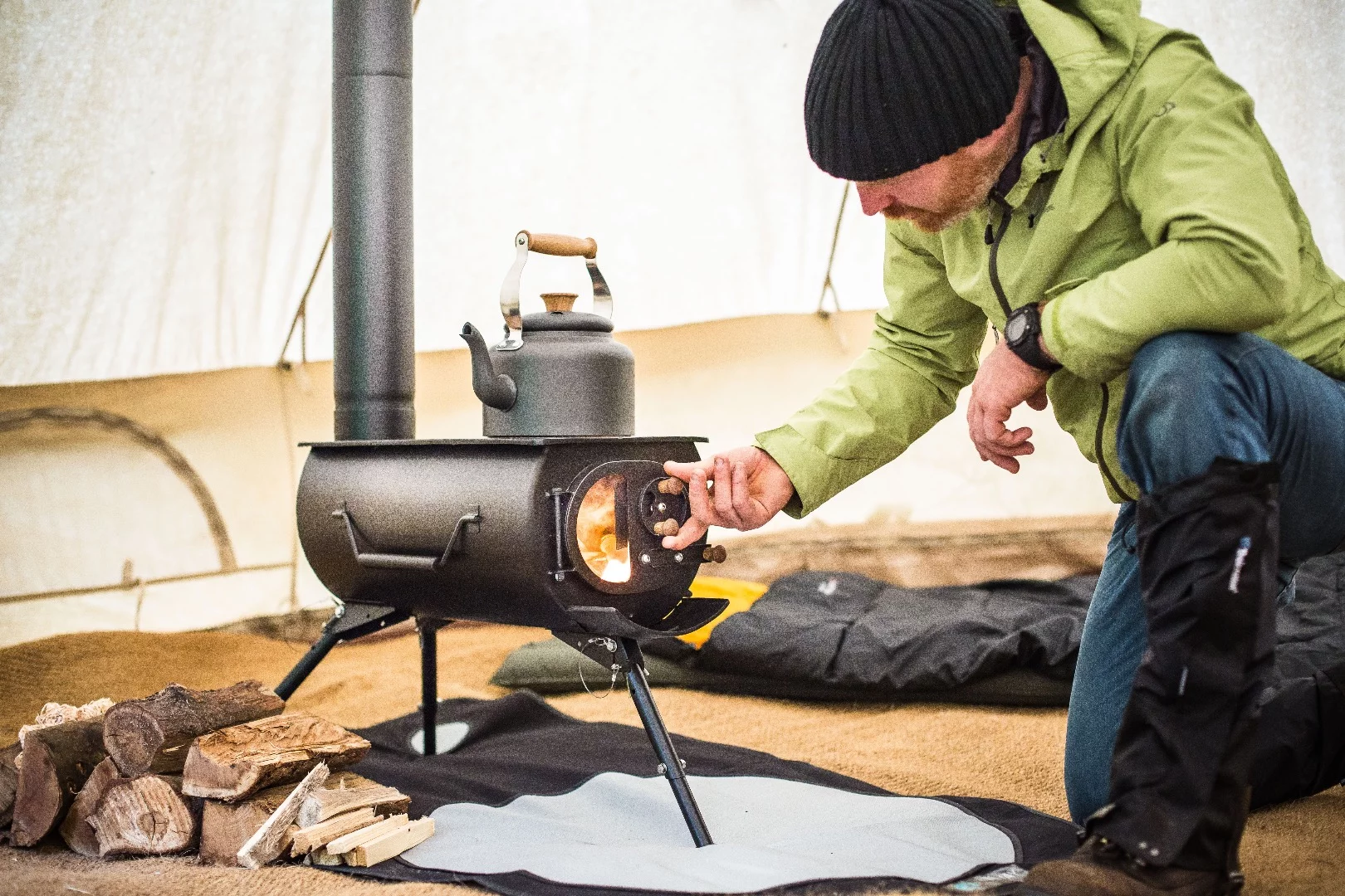 The stove sports a glass window and removable top plate