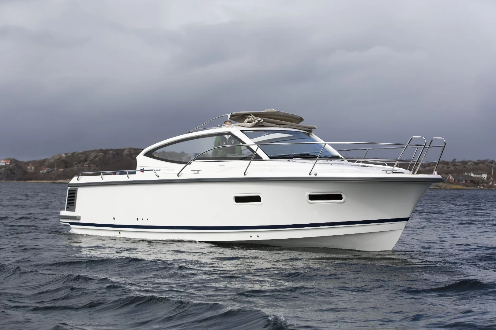 The Nimbus 305 Drophead's canvas roof folds out at the push of a button