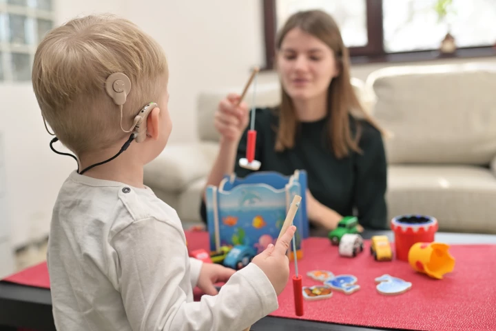 A child with conventional cochlear implants