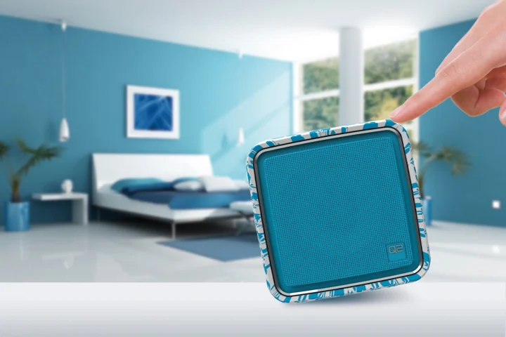 The Q2 Internet Radio has its four pre-allocated stations changed by tipping the device onto its side, its volume adjusted by raising or lowering the front end, and is muted by placing the speaker face down
