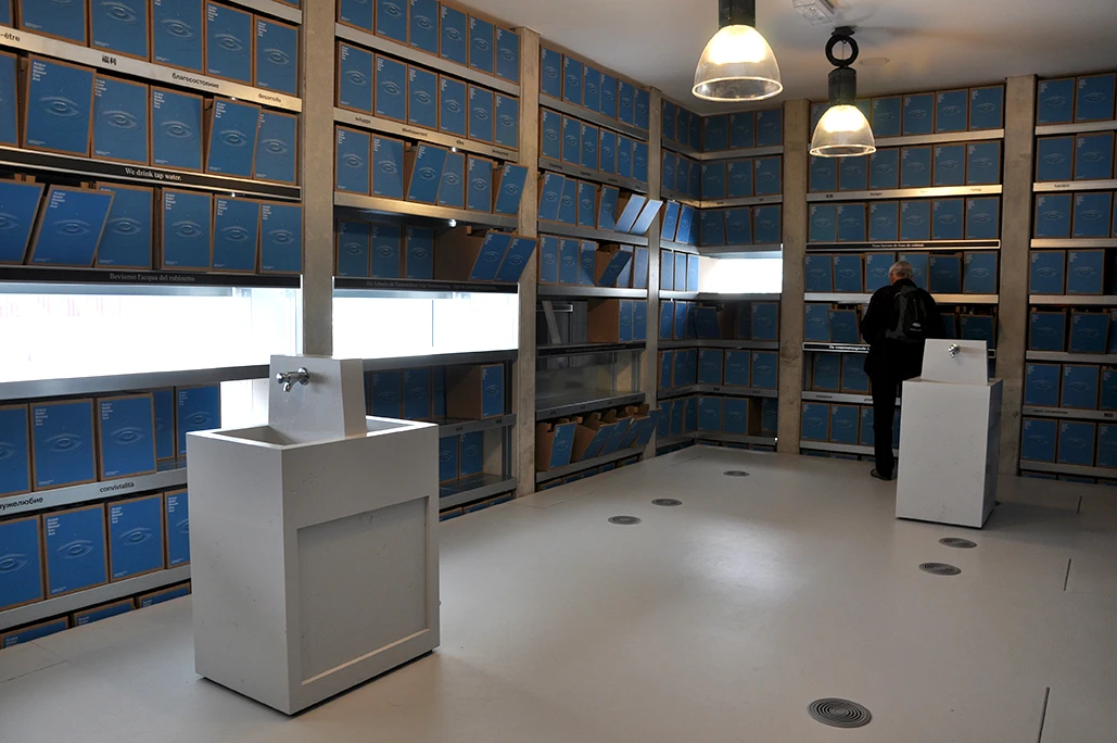 Visitors can take a water cup and fill it up inside the Swiss Pavilion