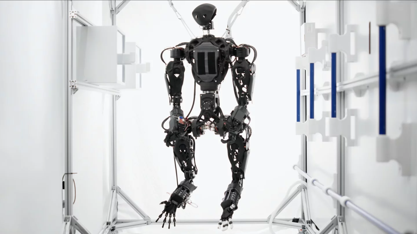 Two arms anchor the robot to interior surfaces while the other two do the work