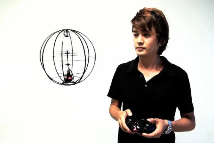 The Kyosho Space Ball flies like an R/C helicopter, but can bounce off obstacles with ease and even spread fragrances throughout the room