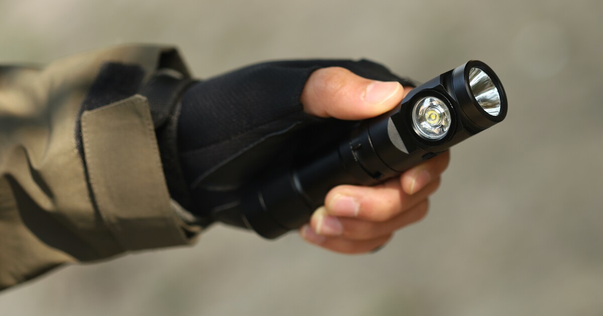 L1 flashlight features separate spot and flood beams on a rotating head