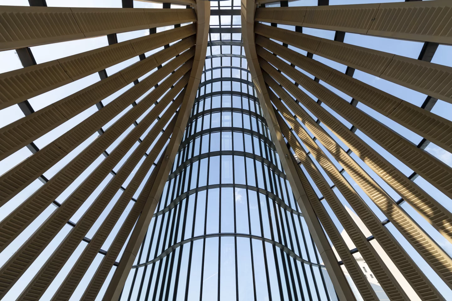 The National Bank of Kuwait Headquarters' glazing is shaded by concrete fins, which run the length of the building