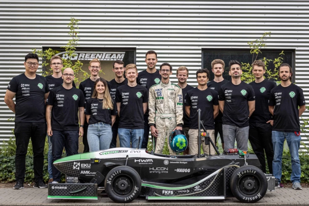 GreenTeam members poses with their world-record car