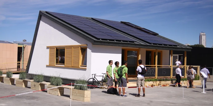 The Romanian Solar Decathlon team, in front of their Prispa home
