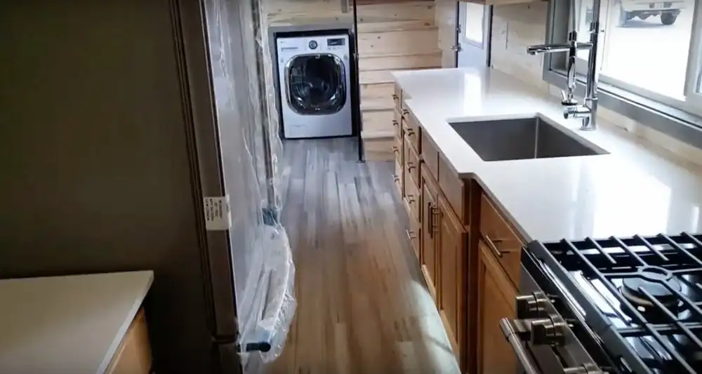 The Tiny Giant's kitchen includes full-size appliances