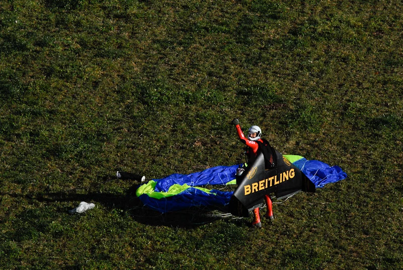 Swiss 'Jetman' Yves Rossy has successfully performed two aerial loops, using his unique strap-on jet-powered wing