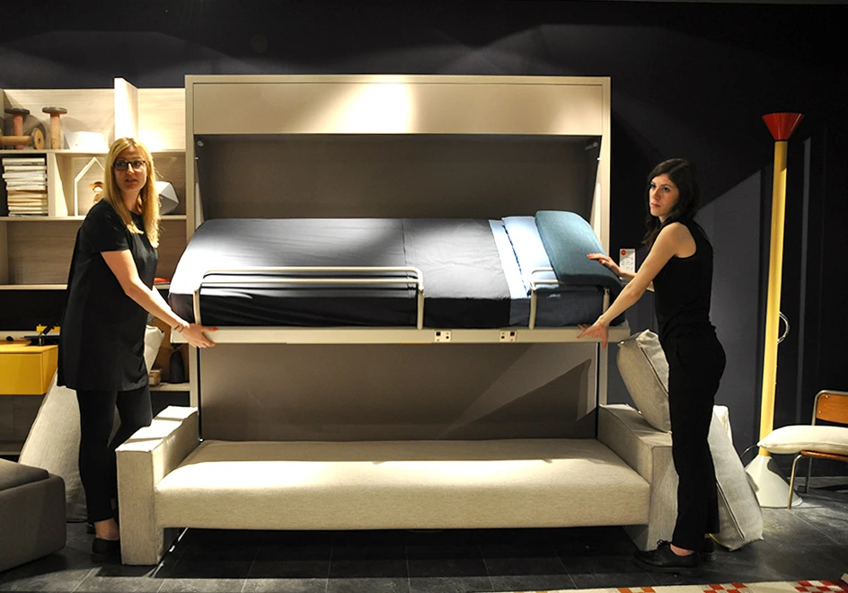 Both the sofa and wall bed fold out to become a sophisticated bunk bed complete with ladder and safety rails