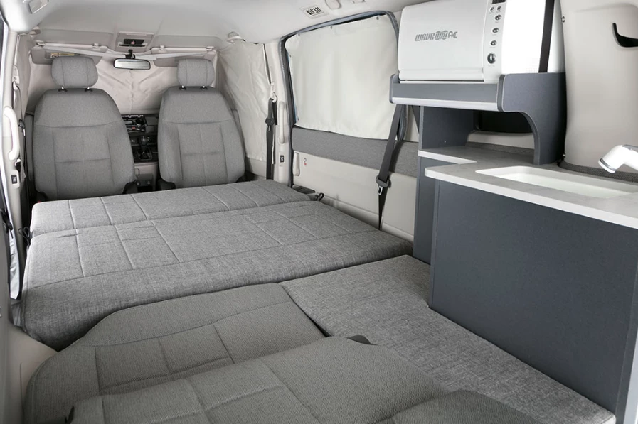 Two rear benches folded into the lower bed