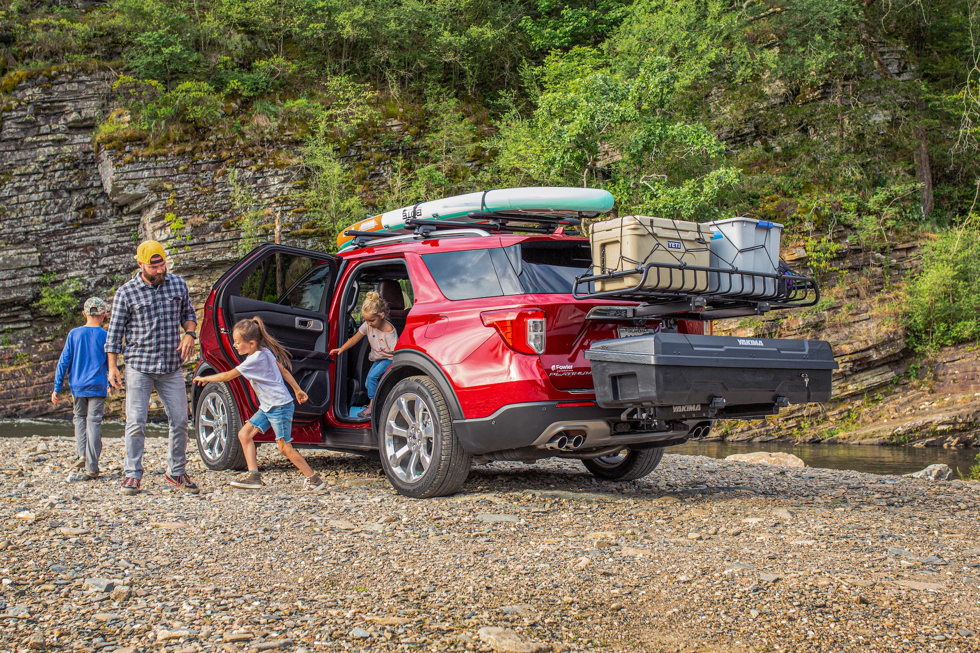 With all that gear on the hitch, the roof is free to hold the boards, and the cabin free to carry the family
