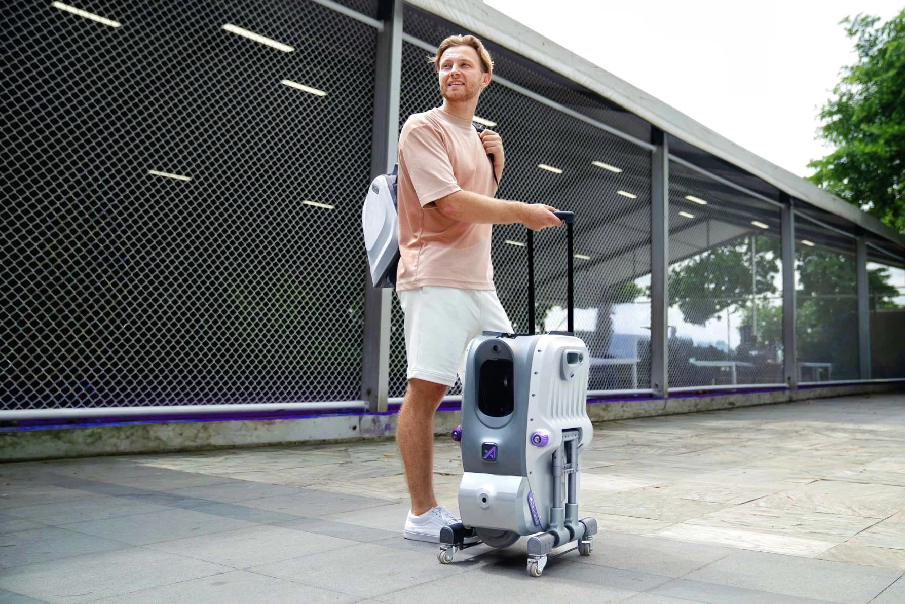 The robot can be pulled like a wheeled suitcase when not in use
