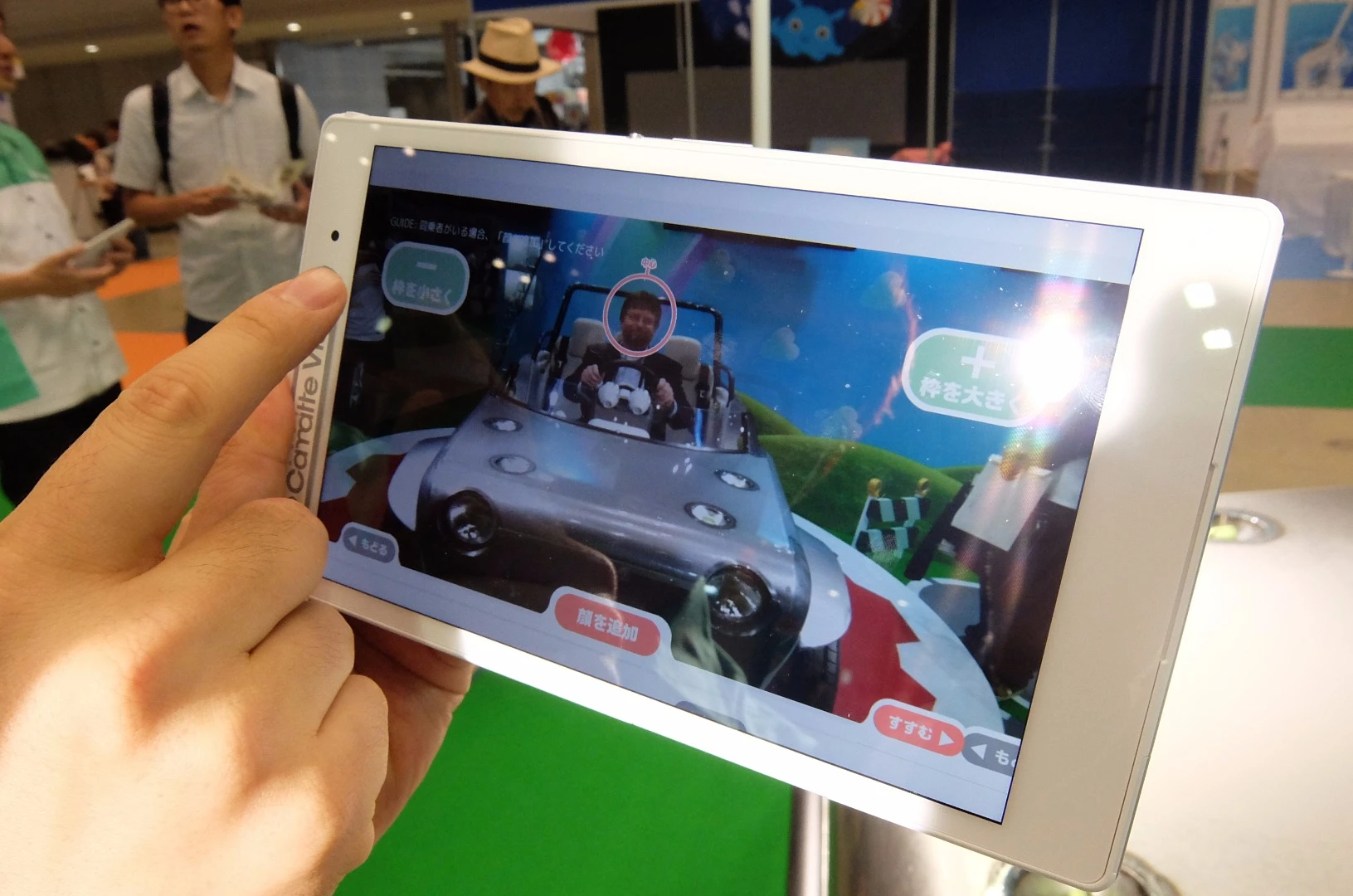 Step one of the process. Your face is captured, while sitting in the real car, by the camera on the dedicated Camette Vision tablet. It is then loaded on to the 3D model