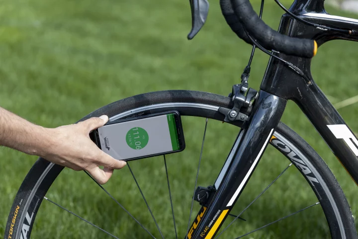 The PSIcle sensor (hidden here by the smartphone) is currently on Kickstarter