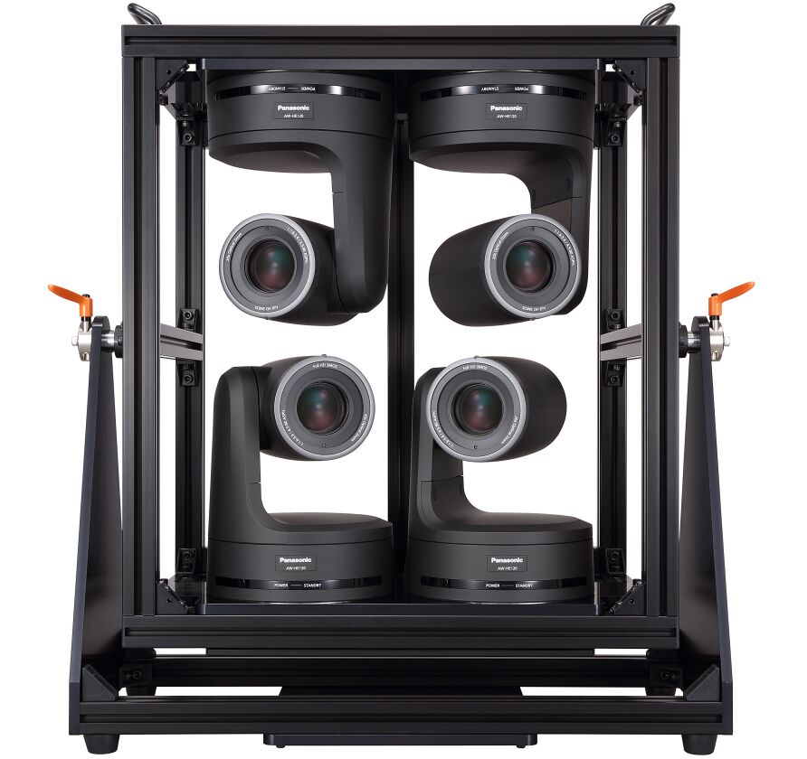 Software is used to “seamlessly” stitch the four cameras’ shots together in real time, side-by-side, to form one really wide picture
