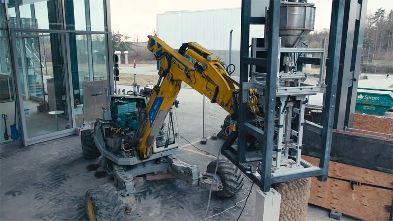 Plans call for ETH Zurich's HEAP autonomous excavator to be part of the impact printing system