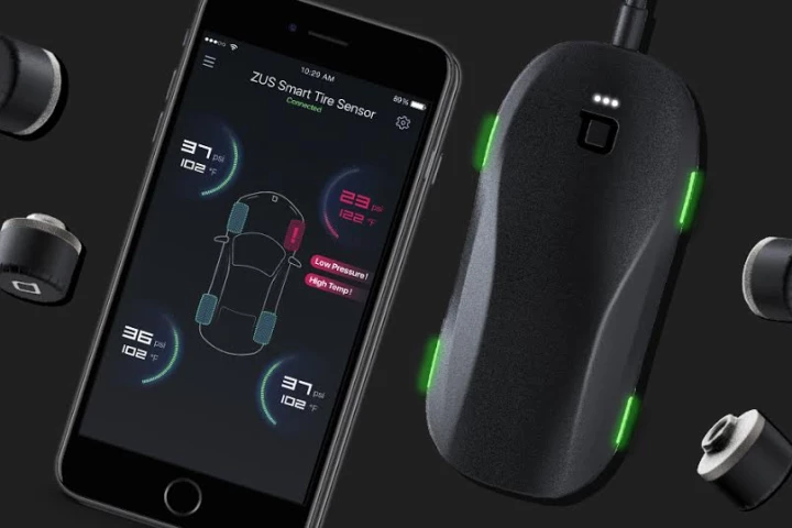 The Zus Smart Tire Safety Monitor consists of sensors fastened to the tire valve and a wireless receiver that collects data to share with a smartphone app
