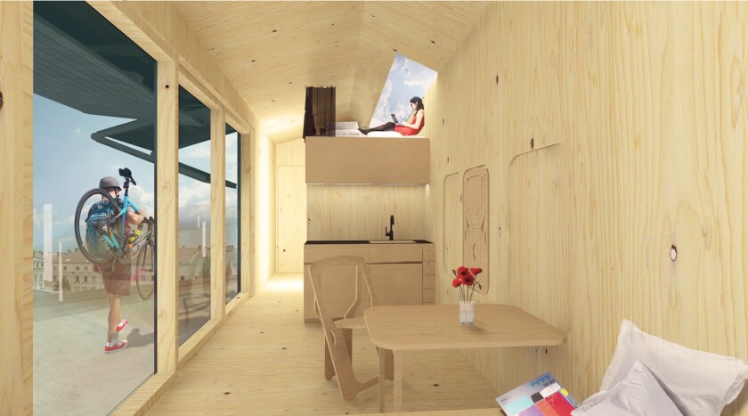 The Cabin Spacey has a number of space-saving features, including foldable chairs, a foldable table and a multifunctional kitchenette, bed and storage unit