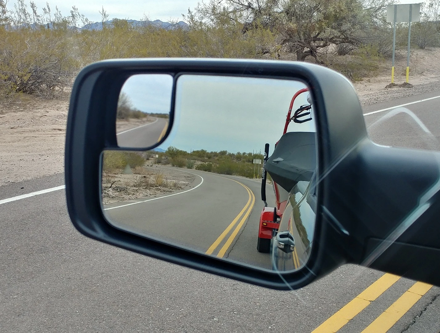 With the big trailering mirrors and now-standard convex mirror on the edge, stretching the mirrors for better vision around the trailer is only required with large, long rigs